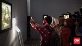 Pameran ini menampilkan 17 reproduksi lukisan karya Leonardo da Vinci lewat pencitraan digital, termasuk lukisan Mona Lisa ini. (CNN Indonesia/Adhi Wicaksono)