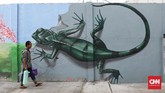 Sebagai kota metropolitan yang bertumbuh, Jakarta terus bersolek, memoles warna-warni mural sembari mengusung beragam tema. (CNNIndonesia/Safir Makki)