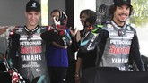 Fabio Quartararo (kiri) akan kembali berduet dengan Franco Morbidelli di Petronas Yamaha pada MotoGP 2020. Musim depan Quartararo akan pindah ke tim pabrikan Yamaha. (Mohd RASFAN/AFP)