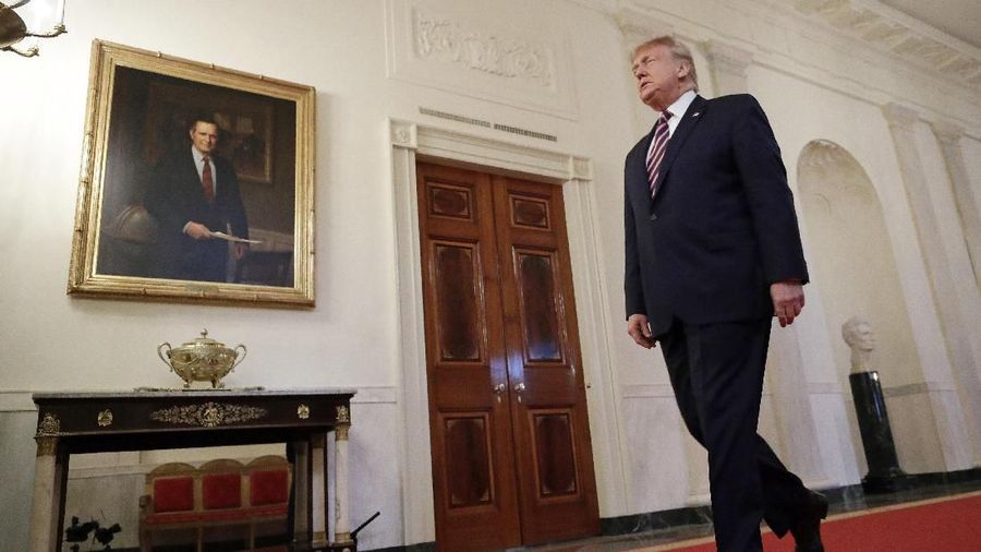 President Donald Trump walks to speak in the East Room of the White House in Washington, Thursday, Feb. 6, 2020. (AP Photo/Patrick Semansky)