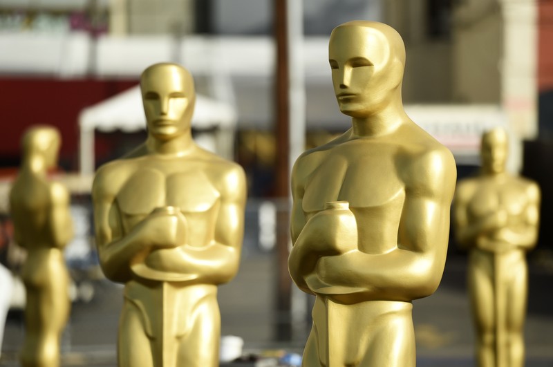 Oscar statues stand off of Hollywood Boulevard in preparation for Sunday's 92nd Academy Awards at the Dolby Theatre, Wednesday, Feb. 5, 2020, in Los Angeles. (AP Photo/Chris Pizzello)