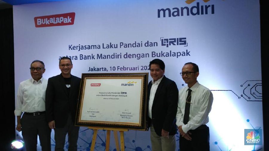 PT Bank Mandiri Tbk (BMRI) bekerjasama dengan BukaLapak untuk memberdayakan 1,5 juta warung Mitra Bukalapak menjadi Agen Laku Pandai.
