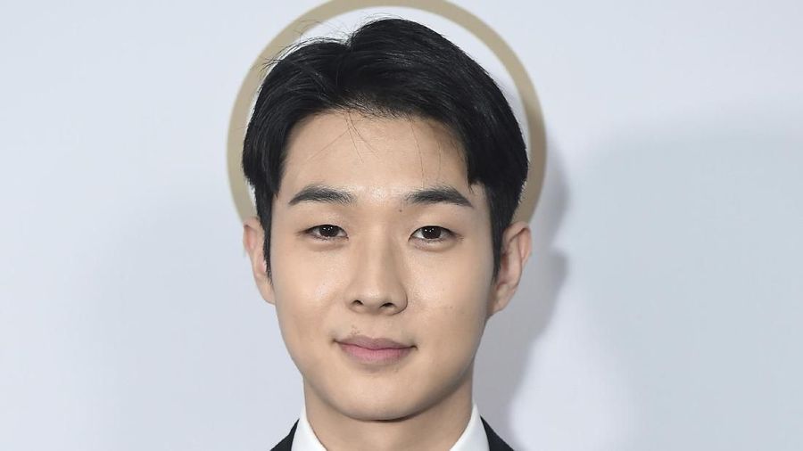 Pemain Film Parasite Choi Woo Shik. (Photo by Jordan Strauss/Invision for the Producers Guild of America/AP Images)