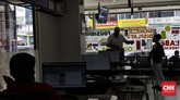 Aktivitas di salah satu gerai percetakan di Jakarta, Rabu (12/2). Industri percetakan atau grafika diramal masih bertumbuh pada 2020. (CNN Indonesia/Adhi Wicaksono).