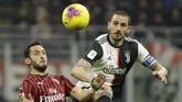 AC Milan menjamu Juventus dalam laga semifinal pertama Coppa Italia di Stadion San Siro, Jumat (14/2) dini hari WIB. (AP Photo/Luca Bruno)