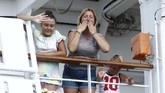 Perempuan (83) asal AS itu dikonfirmasi positif corona ketika sedang dalam penerbangan yang membawa penumpang kapal Westerdam bersama 142 orang lain ke Malaysia. (AP Photo/Heng Sinith)