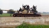 Menurut stasiun televisi Suriah, Al-Ikhbariya, pasukan Suriah saat ini masih terlibat pertempuran dengan pemberontak di sebagian kawasan pedesaan Aleppo. (SANA via AP)