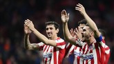 Para pemain Atletico Madrid merayakan kemenangan timnya atas Liverpool pada leg pertama babak 16 besar Liga Champions 2019/2020. (AP Photo/Manu Fernandez)