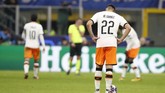 Valencia berhasil mencetak satu gol balasan namun kekalahan 1-4 di leg pertama membuat tugas mereka bakal berat saat menjamu Atalanta. (AP Photo/Antonio Calanni)