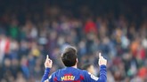 Dengan tambahan empat gol Lionel Messi kini berada di puncak daftar top skor Liga Spanyol dengan 18 gol, unggul lima gol atas Karim Benzema. (AP Photo/Joan Monfort)