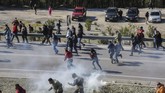 Pemerintah Yunani hendak membangun kamp penampungan imigran baru dengan fasilitas yang lebih lengkap. (Photo by Manolis LAGOUTARIS / AFP)