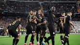 Kemenangan 2-1 di markas Real Madrid membuat Manchester City punya peluang bagus untuk lolos ke perempat final. (Photo by JAVIER SORIANO / AFP)