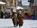 Masker dan Kerudung Hitam di Situs Ziarah Irak
