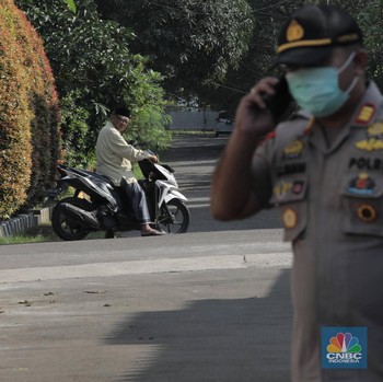 Melihat Pengamanan Kediaman Pasien Corona