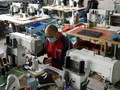FOTO: Manufaktur China Bangkit Walau Virus Corona Melanda