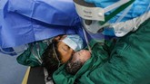 Sejumlah ibu hamil juga dilaporkan stres dan cemas menunggu kelahiran anak mereka akibat virus corona. (Photo by STR / AFP)