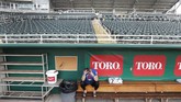 Kompetisi bisbol terkemuka, Major League Baseball (MLB) juga terkena aturan pengosongan tribune stadion imbas virus corona. (AP Photo/Elise Amendola)