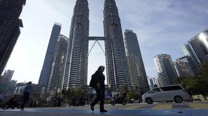 Malaysia putuskan untuk melakukan lockdown demi menghentikan penyebaran virus Corona. (AP/Vincent Thian) Malaysia putuskan untuk melakukan lockdown demi menghentikan penyebaran virus Corona. (AP/Vincent Thian)