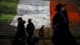Proyeksi bendera Italia di tembok di Yerusalem sebagai tanda dukungan bagi Italia yang sedang memerangi virus corona. (AFP/Menahem Kahana)