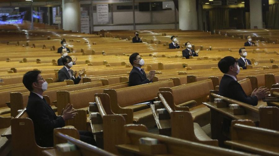 Pastors wearing face masks attend a service at the Yoido Full Gospel Church in Seoul, South Korea, March 15, 2020. (AP Photo/Ahn Young-joon)