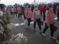 China Cabut Lockdown, Ribuan Warga Bergegas Tinggalkan Wuhan