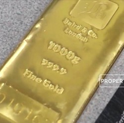 Kilau Emas Memudar Kala The Fed Gak Pede Inflasi Bisa Turun