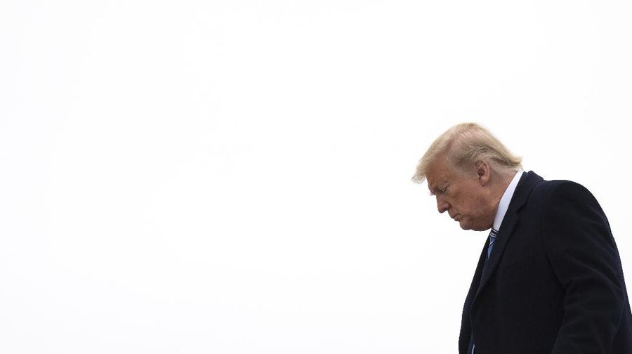 President Donald Trump arrives at Andrews Air Force Base, Md., Saturday, March 28, 2020. Trump is returning from Norfolk, Va., for the sailing of the USNS Comfort, which is headed to NewYork. (Jim Watson/Pool Photo via AP)