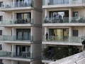 FOTO: Pandemi Corona dan Kehangatan dari Balkon Apartemen