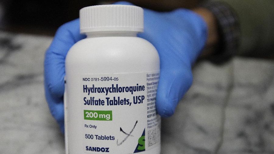 This Monday, April 6, 2020, photo shows an arrangement of hydroxychloroquine pills in Las Vegas. President Donald Trump and his administration kept up their out-sized promotion Monday of an malaria drug not yet officially approved for fighting the new coronavirus, even though scientists say more testing is needed before it’s proven safe and effective against COVID-19. Trump trade adviser Peter Navarro championed hydroxychloroquine in television interviews a day after the president publicly put his faith in the medication to lessen the toll of the coronavirus pandemic. (AP Photo/John Locher)
