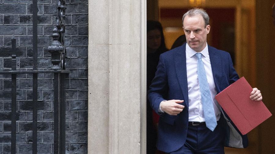 Britain's Foreign Secretary Dominic Raab leaves a meeting in Downing Street, London, Monday April 6, 2020. Britain's Prime Minister Boris Johnson has been moved to the intensive care unit of a London hospital on Monday, April 6, 2020 after his coronavirus symptoms worsened. Johnson’s office says Johnson is conscious and does not require ventilation at the moment. Johnson was admitted to St. Thomas’ Hospital late Sunday, 10 days after he was diagnosed with COVID-19. Johnson has asked Foreign Secretary Dominic Raab to deputize for him. (Dominic Lipinski/PA via AP)