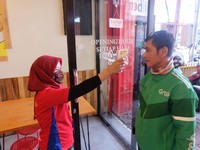 Keren! Driver Grab Dilengkapi Proteksi, Ini Penampakannya