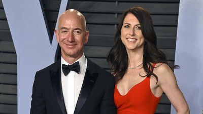 FILE - In this March 4, 2018 file photo, Jeff Bezos and wife MacKenzie Bezos arrive at the Vanity Fair Oscar Party in Beverly Hills, Calif. The founder of Amazon and his wife have made their largest political donation to date, giving $10 million to With Honor, a nonpartisan political-action committee devoted to helping military veterans running for Congress. (Photo by Evan Agostini/Invision/AP, File)