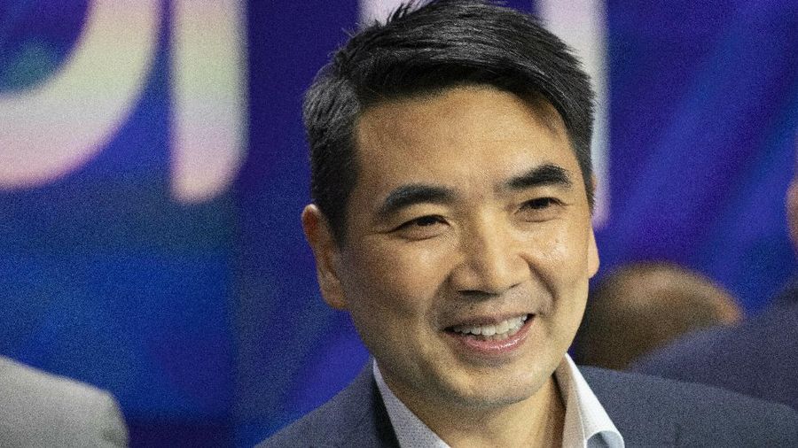 Zoom CEO Eric Yuan attends the opening bell at Nasdaq as his company holds its IPO, Thursday, April 18, 2019, in New York. The videoconferencing company is headquartered in San Jose, Calif. (AP Photo/Mark Lennihan)