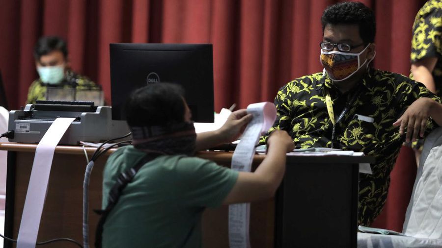 Pelayanan Pegadaian ditengah Pandemi Covid-19. (CNBC Indonesia/Muhammad Sabki)