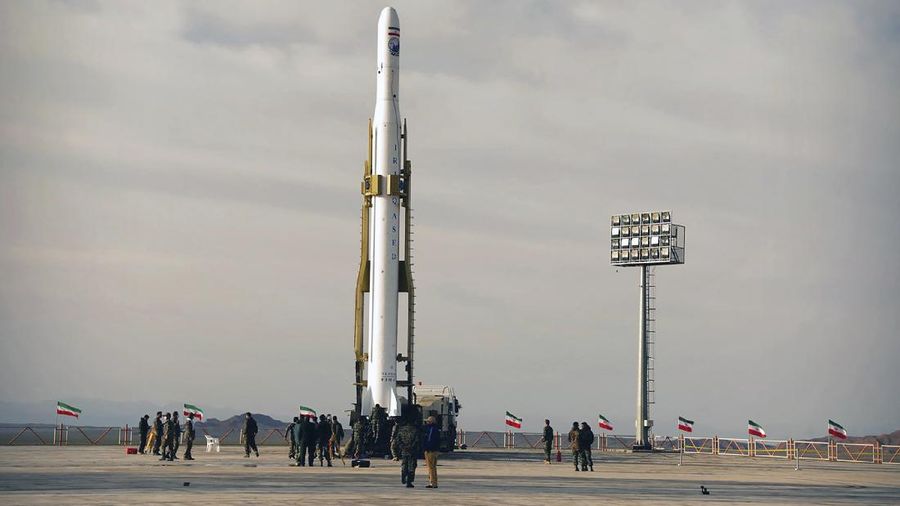 In this photo released Wednesday, April 22, 2020, by Sepahnews, an Iranian rocket carrying a satellite is prepared for launch from an undisclosed site believed to be in Iran's Semnan province. Iran's Revolutionary Guard said Wednesday it put the Islamic Republic's first military satellite into orbit, dramatically unveiling what experts described as a secret space program with a surprise launch that came amid wider tensions with the United States. (Sepahnews via AP)