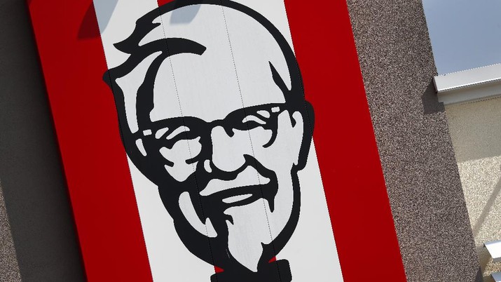 In this photo taken Tuesday, July 30, 2019, a sign outside a Kentucky Fried Chicken restaurant in Conyers, Ga.is shown. (AP Photo/John Bazemore)