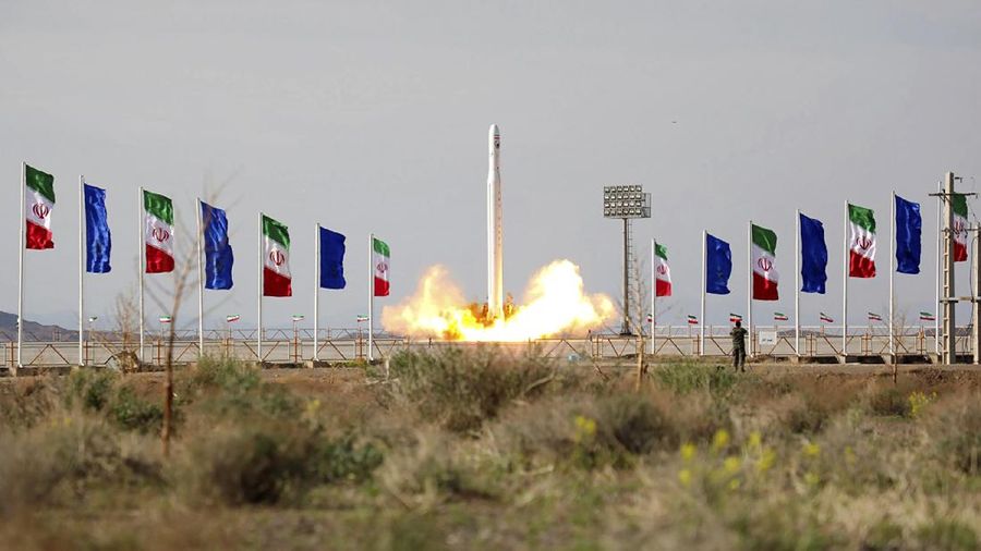 In this photo released Wednesday, April 22, 2020, by Sepahnews, an Iranian rocket carrying a satellite is prepared for launch from an undisclosed site believed to be in Iran's Semnan province. Iran's Revolutionary Guard said Wednesday it put the Islamic Republic's first military satellite into orbit, dramatically unveiling what experts described as a secret space program with a surprise launch that came amid wider tensions with the United States. (Sepahnews via AP)