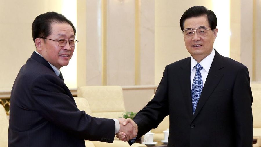 In this Tuesday, Aug. 14, 2012 file photo provided by China's Xinhua News Agency, Jang Song Thaek, North Korea's vice chairman of the powerful National Defense Commission, attends the third meeting on developing the economic zones in North Korea, in Beijing. Two South Korean lawmakers say they were told by intelligence officials that two associates of North Korean leader Kim Jong Un's powerful uncle Jang were executed last month. They say the uncle has not been seen in public since then and may have been dismissed. There was no way to independently confirm the report about Jang. (AP Photo/Xinhua, Li Xin, File)  NO SALES