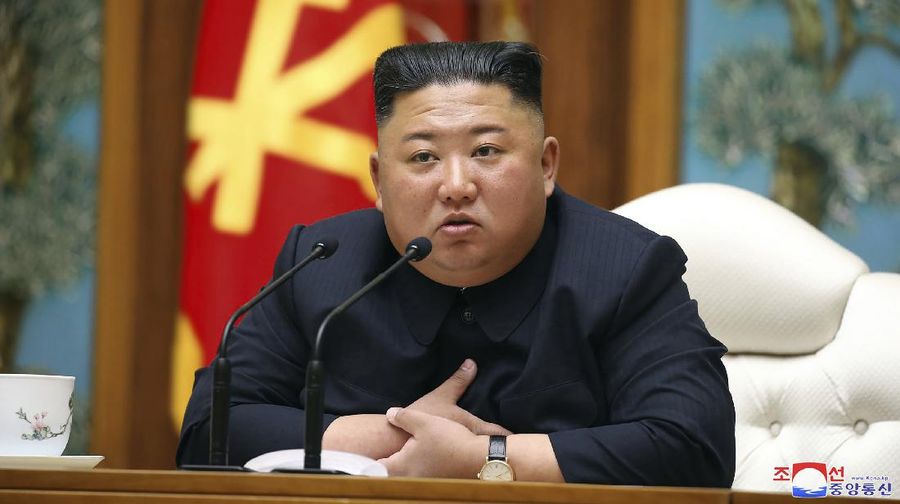 FILE - In this Saturday, April 11, 2020, file photo provided by the North Korean government, North Korean leader Kim Jong Un attends a politburo meeting of the ruling Workers' Party of Korea in Pyongyang. The South Korean government is looking into reports that North Korean leader Kim is in fragile condition after surgery. Officials from South Korea’s Unification Ministry and National Intelligence Service couldn’t immediately confirm the reports citing an anonymous U.S. official who said Kim was in “grave danger.” Independent journalists were not given access to cover the event depicted in this image distributed by the North Korean government. The content of this image is as provided and cannot be independently verified. Korean language watermark on image as provided by source reads: 