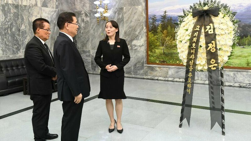 FILE - In this April 27, 2018, file photo, North Korean leader Kim Jong Un signs a guestbook next to his sister Kim Yo Jong, right, inside the Peace House at the border village of Panmunjom in Demilitarized Zone. With North Korea saying nothing so far about outside media reports that leader Kim Jong Un may be unwell, there’s renewed worry about who’s next in line to run a nuclear-armed country that’s been ruled by the same family for seven decades. (Korea Summit Press Pool via AP, File)