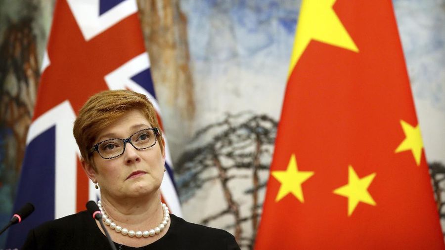 Australian Foreign Minister Marise Payne listens to a reporter's question during a joint press conference with Chinese Foreign Minister Wang Yi at the Diaoyutai State Guesthouse in Beijing, Thursday, Nov. 8, 2018. The foreign ministers of China and Australia are meeting in what is being seen as a sign of a thaw in the recently frosty relationship between the key economic partners. (AP Photo/Mark Schiefelbein)