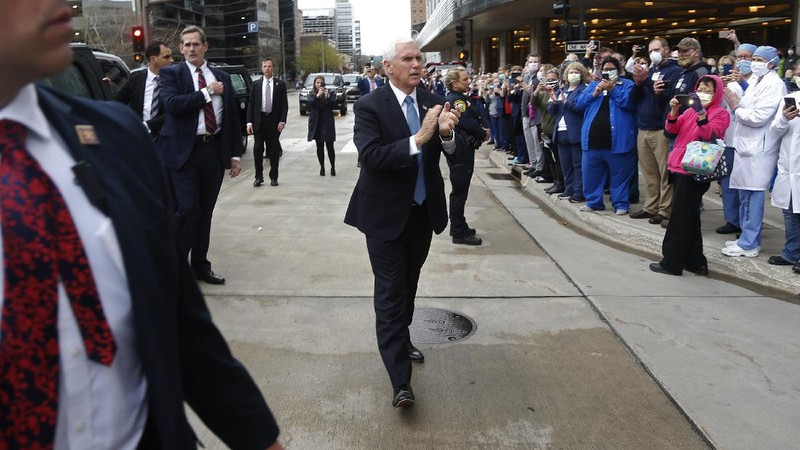 Vice President Mike Pence visits the molecular testing lab at Mayo Clinic Tuesday, April 28, 2020, in Rochester, Minn., where he toured the facilities supporting COVID-19 research and treatment. Pence chose not to wear a face mask while touring the Mayo Clinic in Minnesota. It's an apparent violation of the world-renowned medical center's policy requiring them. (AP Photo/Jim Mone)