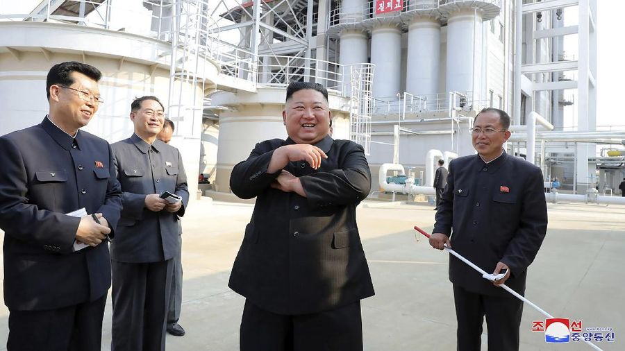 ADDING CITY - In this Friday, May 1, 2020, photo provided by the North Korean government, North Korean leader Kim Jong Un, center, visits a fertilizer factory in Sunchon, South Pyongan province, near Pyongyang, North Korea. Kim made his first public appearance in 20 days as he celebrated the completion of the fertilizer factory, state media said Saturday, May 2, 2020, ending an absence that had triggered global rumors that he may be seriously ill.  Independent journalists were not given access to cover the event depicted in this image distributed by the North Korean government. The content of this image is as provided and cannot be independently verified. Korean language watermark on image as provided by source reads: 