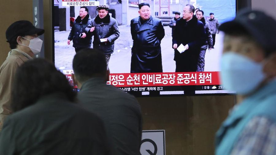 ADDING CITY - In this Friday, May 1, 2020, photo provided by the North Korean government, North Korean leader Kim Jong Un, center, visits a fertilizer factory in Sunchon, South Pyongan province, near Pyongyang, North Korea. Kim made his first public appearance in 20 days as he celebrated the completion of the fertilizer factory, state media said Saturday, May 2, 2020, ending an absence that had triggered global rumors that he may be seriously ill.  Independent journalists were not given access to cover the event depicted in this image distributed by the North Korean government. The content of this image is as provided and cannot be independently verified. Korean language watermark on image as provided by source reads: 