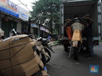 Corona & Larangan Mudik Bikin Bisnis Pengiriman Motor Anjlok