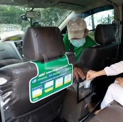Terjang Risiko, Kisah Driver GrabCar Antar Tenaga Medis