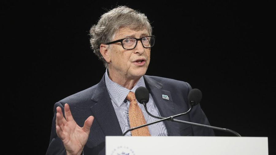 Philanthropist and Co-Chairman of the Bill & Melinda Gates Foundation Bill Gates gestures as he speaks to the audience during the Global Fund to Fight AIDS event at the Lyon's congress hall, central France, Thursday, Oct. 10, 2019. French President Emmanuel Macron said the conference of the Global Fund to fight against AIDS, tuberculosis and malaria raised at least $13.92 billion for the next three years. (Ludovic Marin/Pool Photo via AP)