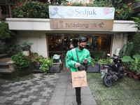 Hore! Merchant GrabFood & GrabKios Bisa Ajukan KUR ke BRI
