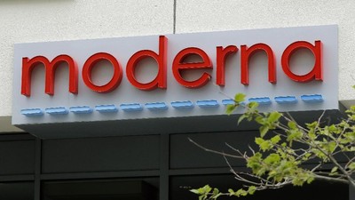 Moderna A sign marks an entrance to a Moderna, Inc., building, Monday, May 18, 2020, in Cambridge, Mass. Moderna announced Monday, May 18, 2020, that an experimental vaccine against the coronavirus showed encouraging results in very early testing, triggering hoped-for immune responses in eight healthy, middle-aged volunteers.(AP Photo/Bill Sikes)