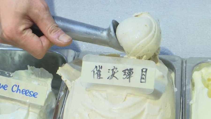 This May 4, 2020, image made from video shows a cup of tear gas flavor ice cream in Hong Kong. A Hong Kong ice cream shop has created this flavor using pepper, in memory of all the tear gas fired by the Hong Kong police in recent months. The flavor is a sign of support for the pro-democracy movement, which is seeking to regain its momentum during the coronavirus pandemic, the shop's owner said. (AP Photo)